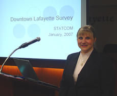 Cherie Ochsenfeld presents the results of the downtown Lafayette survey at a public meeting.