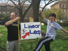 Barret Schloerke and Yumin Zhang facilitating the Linear Leap activity at Spring Fest 2015