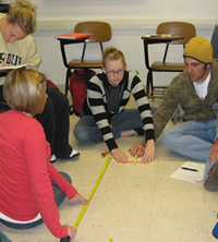 STAT 301 students learn two-way ANOVA using gummy-bear popsicle stick catapults.